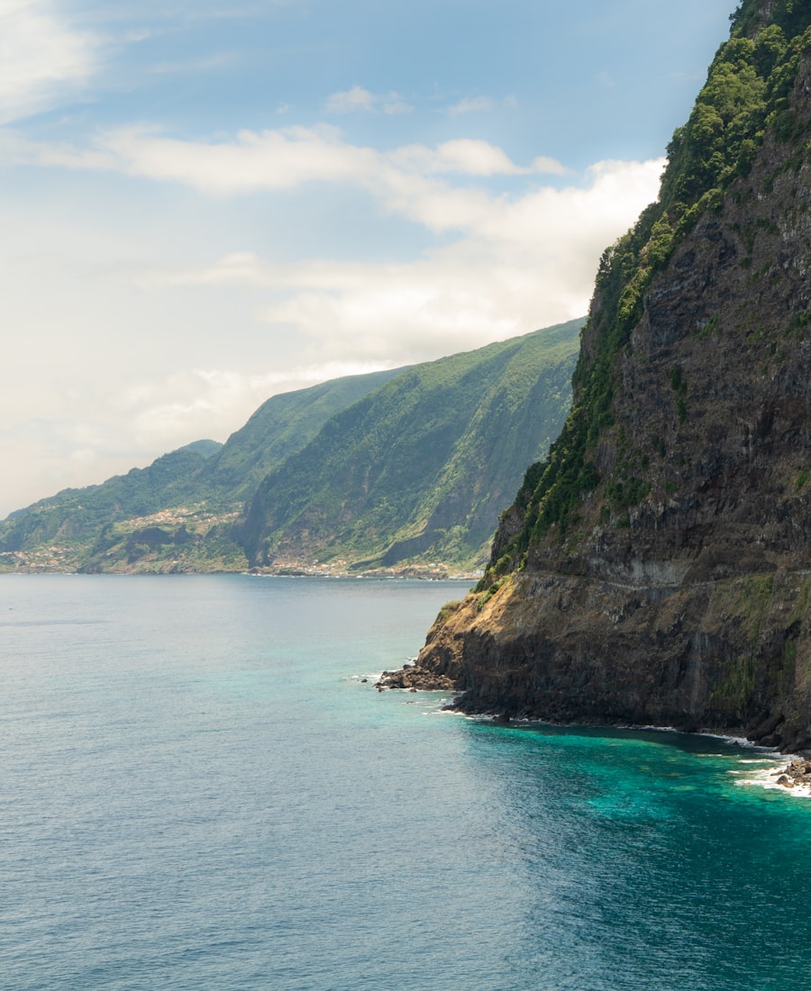 Waterfall beside Madeira cliffs